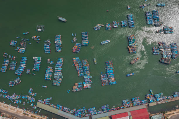 istock Fishing boats are nailing on Cua Be riverfront 1432893352