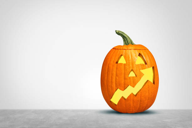 Rising Inflation During The Fall Season Halloween season Inflation concept as Autumn pumpkin symbol with an upward leaning financial chart arrow representing rising Fall seasonal prices and the rising costs of taxes and expenses or higher credit debt as a funny jack o lantern. consumer confidence photos stock pictures, royalty-free photos & images