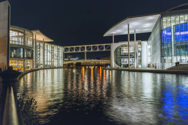 istock modern architecture in the government district in Berlin at night 1432897059