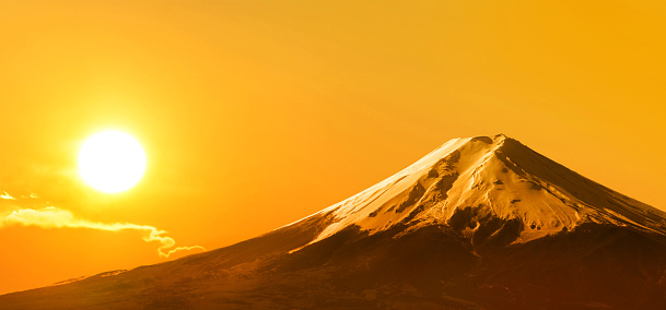 Japanese beautiful sunrise scenery, Mt. Fuji and the rising sun.