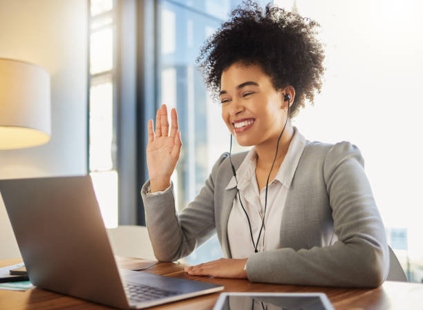 istock Laptop webinar, workshop training and business meeting on global zoom call in office or conference room. Happy smile woman waving and greeting on video conference tradeshow presentation or interview 1432901224