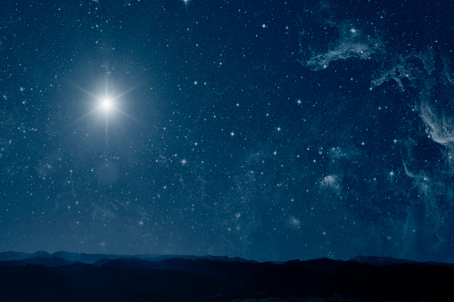 The star shines on the Christmas Eve of Jesus Christ.