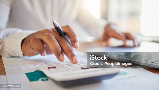 istock Finance, accounting and fintech, a man on a computer and calculator working out his business budget strategy. Businessman at his office desk, laptop, money management and financial investment online. 1432903655