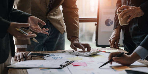 istock Business team collaboration discussing working analyzing with financial data and marketing growth report graph in team, presentation and brainstorming to strategy planning making profit of company. 1432907002