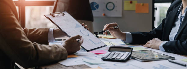 istock Business team collaboration discussing working analyzing with financial data and marketing growth report graph in team, presentation and brainstorming to strategy planning making profit of company. 1432907550