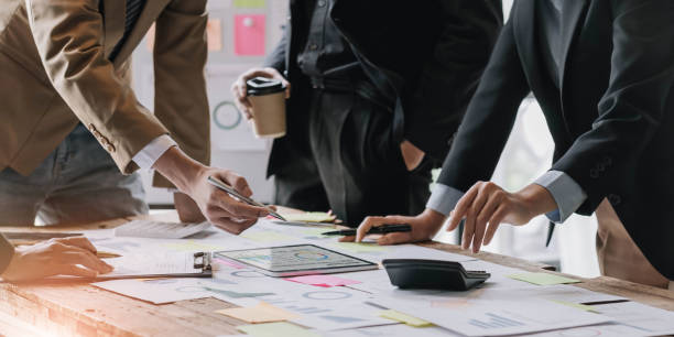 istock Business team collaboration discussing working analyzing with financial data and marketing growth report graph in team, presentation and brainstorming to strategy planning making profit of company. 1432908641