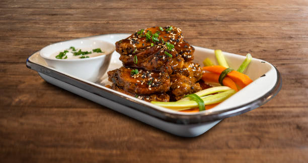 istock bbq wings with salad and tartare 1432911936