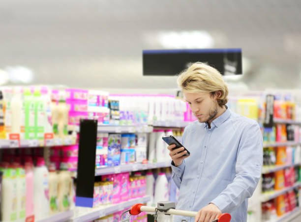 istock shopping in supermarket.(washing powder,detergent,shampoo, soap) 1432919249