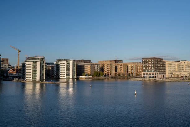 istock Apartment buildings by the water 1432920655