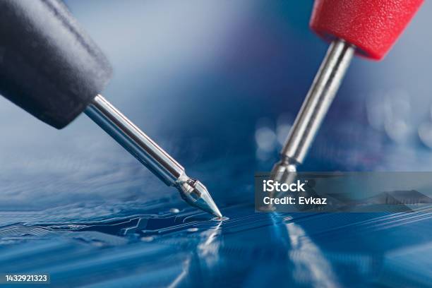 Measuring Electronic Signal From Component On The Pcb Electronics Repair And Digital Technology Stock Photo - Download Image Now