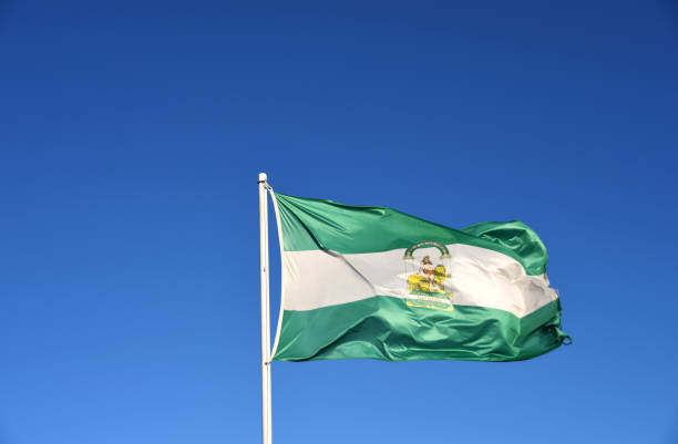 istock Andalusian flag with a blue sky 1432925151