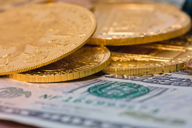 istock Closeup of loose stack of gold coins 1432926133
