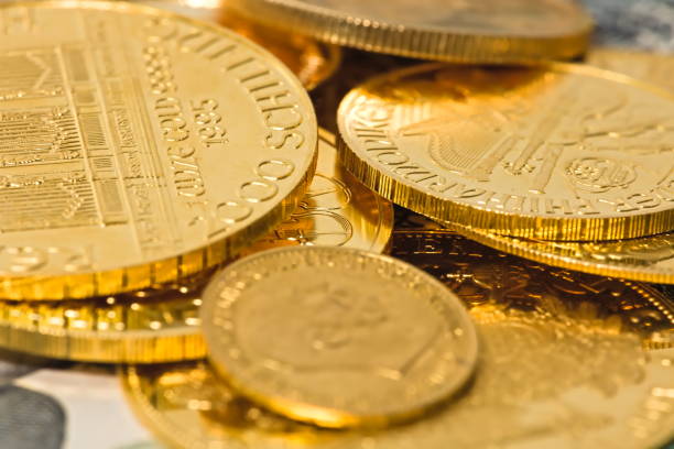 istock Closeup of loose stack of gold coins 1432926161
