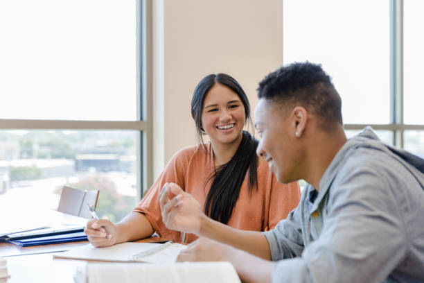 istock While studying together, young woman listens to boyfriend 1432927581