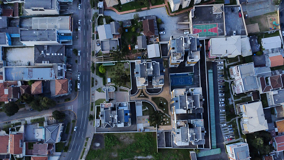 Aerial view of buildings in curitiba, being possible to see houses and streets of the city with bird vision
