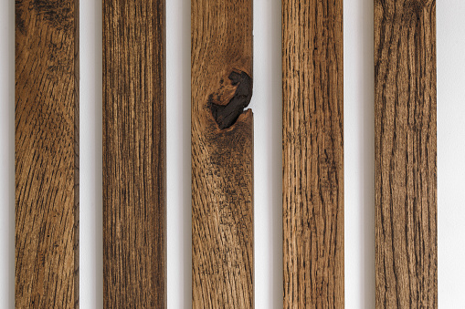 Solid oak wood wall decoration with imperfections. Japandi concept