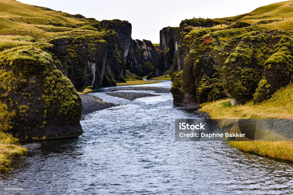 View through the impressive canyon of Fjaðrárgljúfur on Iceland Awe Stock Photo