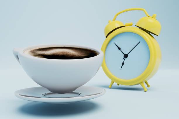 istock time to drink coffee. coffee porridge and alarm clock on a white background. 3D render 1432934667