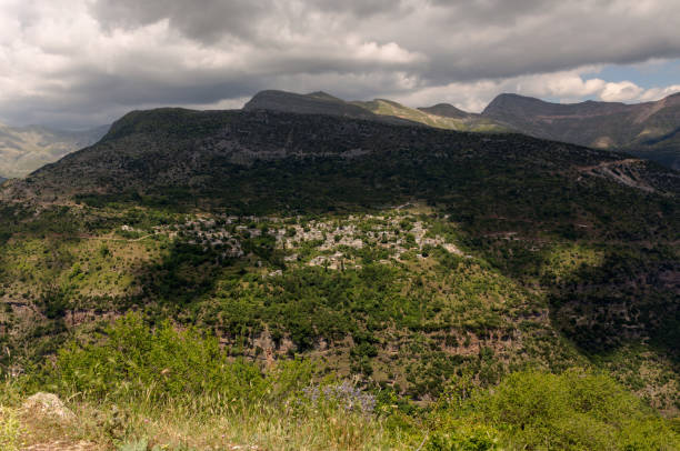 istock Traditional greek village Kalarrytes (Epirus, Greece). 1432936619