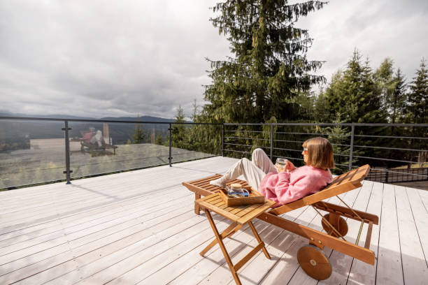 istock Woman rests on terrace in mountains 1432936662