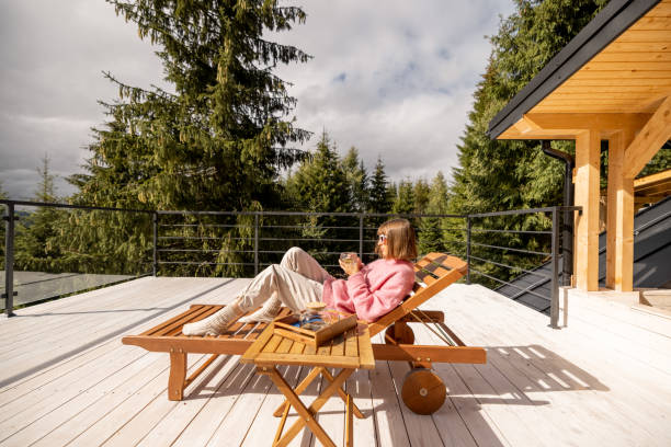 istock Woman rests on terrace in mountains 1432936962