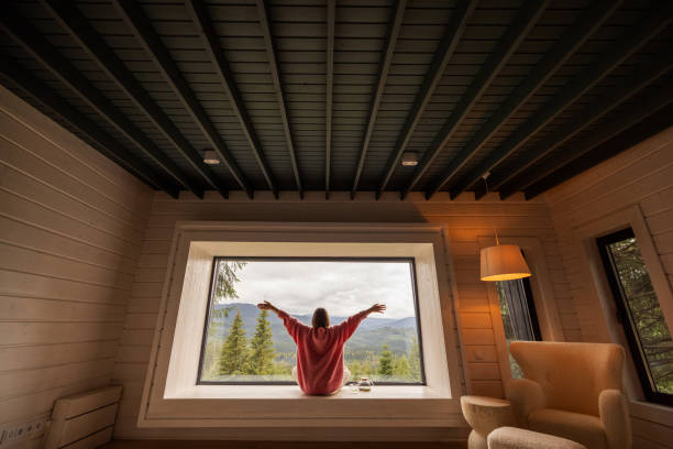 istock Woman rests in house at mountains 1432938097