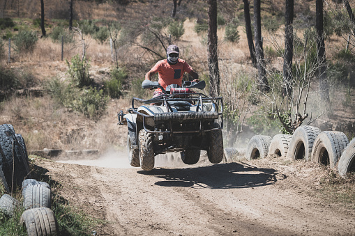 jumping on a quad - four wheeler 4x4 gets some air