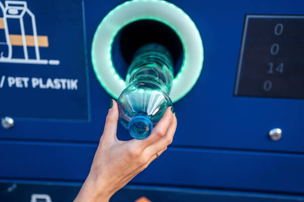 istock Woman hand recycling plastic bottles 1432944172