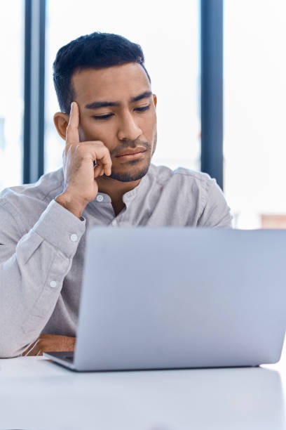 istock Thinking, idea development and business strategy of a businessman working at a office computer. Corporate finance worker focus and attention planning b2b investment growth and company job analytics 1432944490