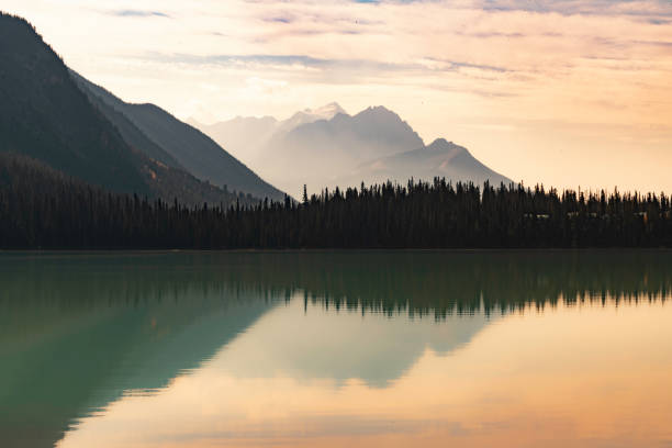 Reflections of surrounding mountains in the waters of Emerald Lake