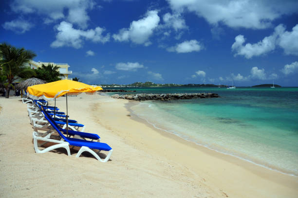 istock Deckchairs and parasols at Marigot bay beach, Marigot, Saint Martin (French part) 1432945766