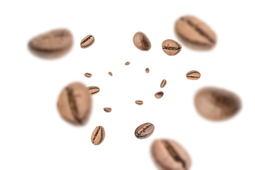 Coffee beans falling background. Black espresso coffee bean flying. Aromatic grain fall isolated on white. Represent breakfast for energy and freshness concept