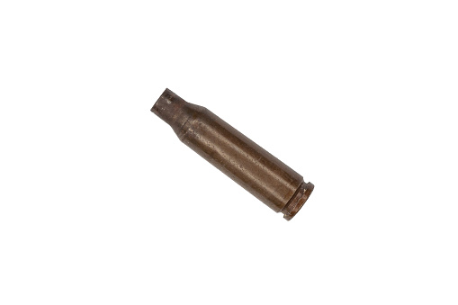 Used firearms cartridge 5,56 x 45 isolated on white background.