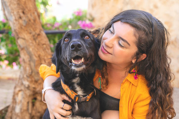 istock Young woman with her dog. 1432952627