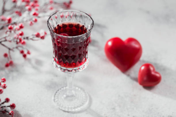 istock Red cocktail, vodka or liqueur and Heart shape decorations 1432953944