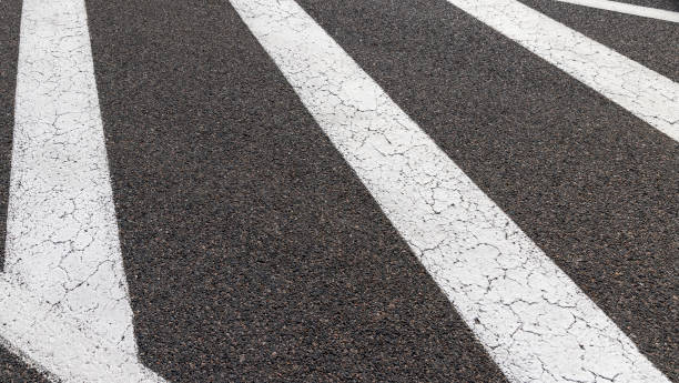 istock Paved highway with white road markings 1432964870