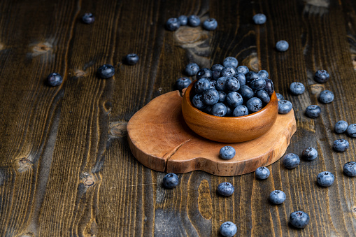 Ripe but long-lying blueberries on the table