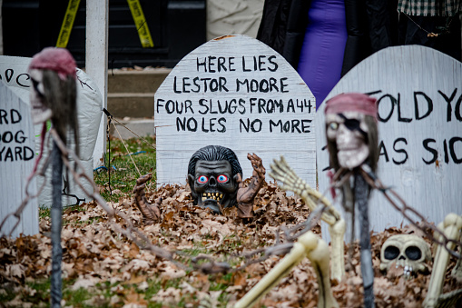 there is a mock graveyard that has been set up on the front yard for halloween in winnipeg Manitoba Canada