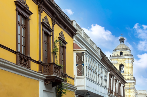 Lima, Peru, old city streets and colorful colonial buildings in historic city center.