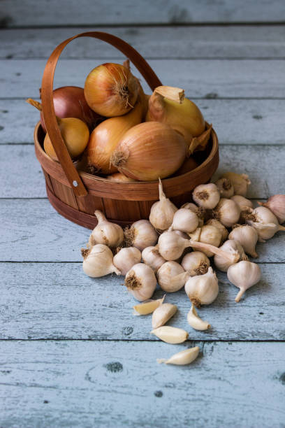istock Fresh raw whole garlic and onions 1432970337