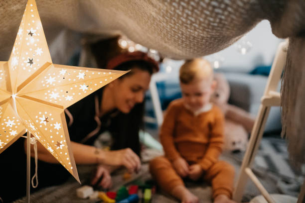 istock Mother and child playing before going to sleep 1432971168