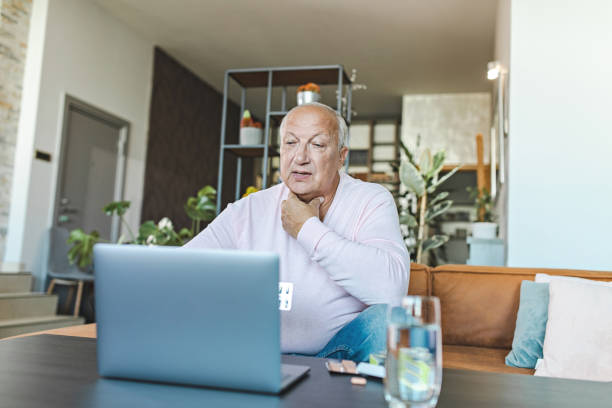 istock Senior Man Consulting a Doctor Online 1432973960