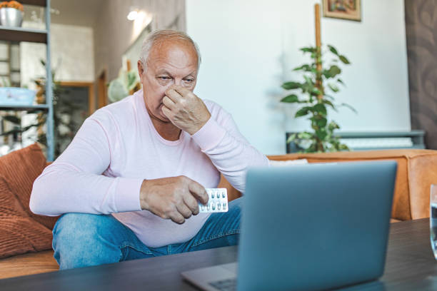 istock Senior Man Consulting a Doctor Online 1432973965