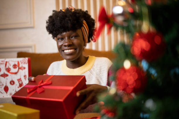 istock Happy woman celebrating Christmas 1432980386