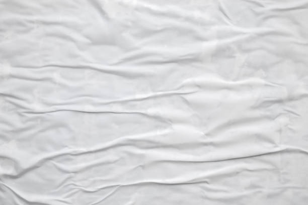 istock white crumpled and creased paper poster texture background 1432986593