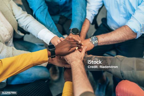 Teamwork Stock Photo - Download Image Now - Community, Multiracial Group, Hands Clasped