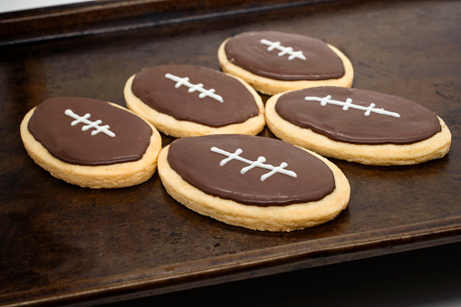Super Bowl party cookies. American Football shape cookies. Home made cookies