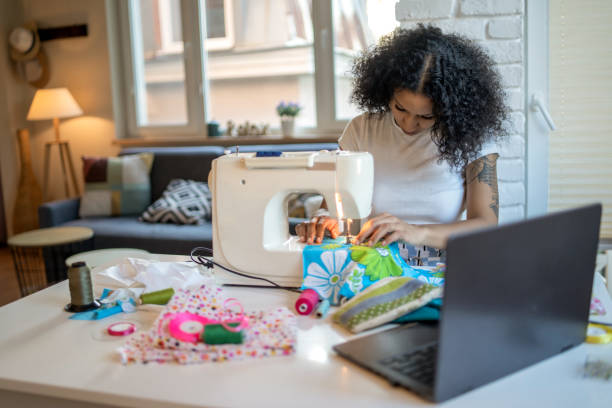 istock Female student tailor sewing at home 1432993832