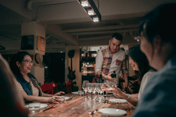 istock A group of friends are having a meal together on a Friday night, eating and drinking 1432995010
