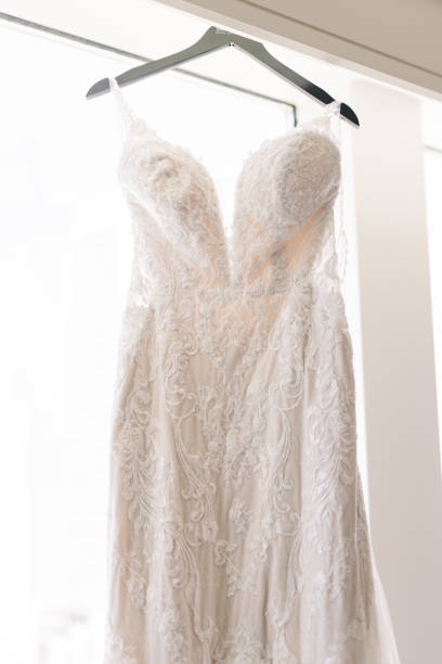 istock Wedding Dress Hanging Up Close-Up 1433001478